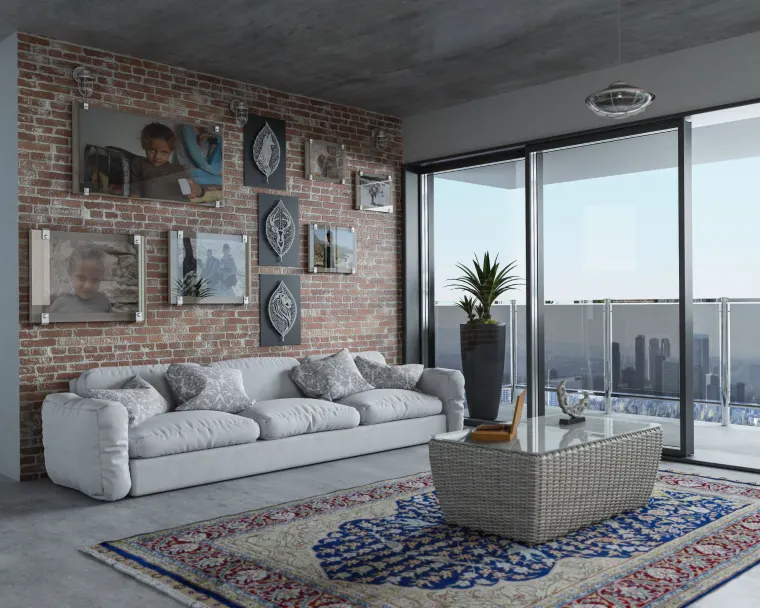 Loft lounge with exposed brick feature wall, framed artwork and a deep sectional sofa