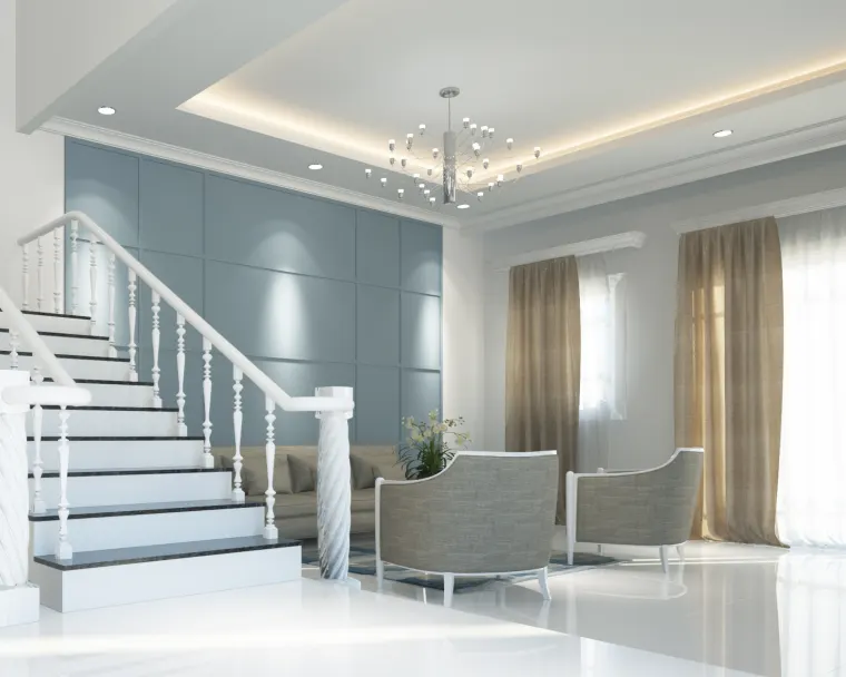 Entrance hall with a white balustrade staircase, panelled feature wall and two upholstered armchairs
